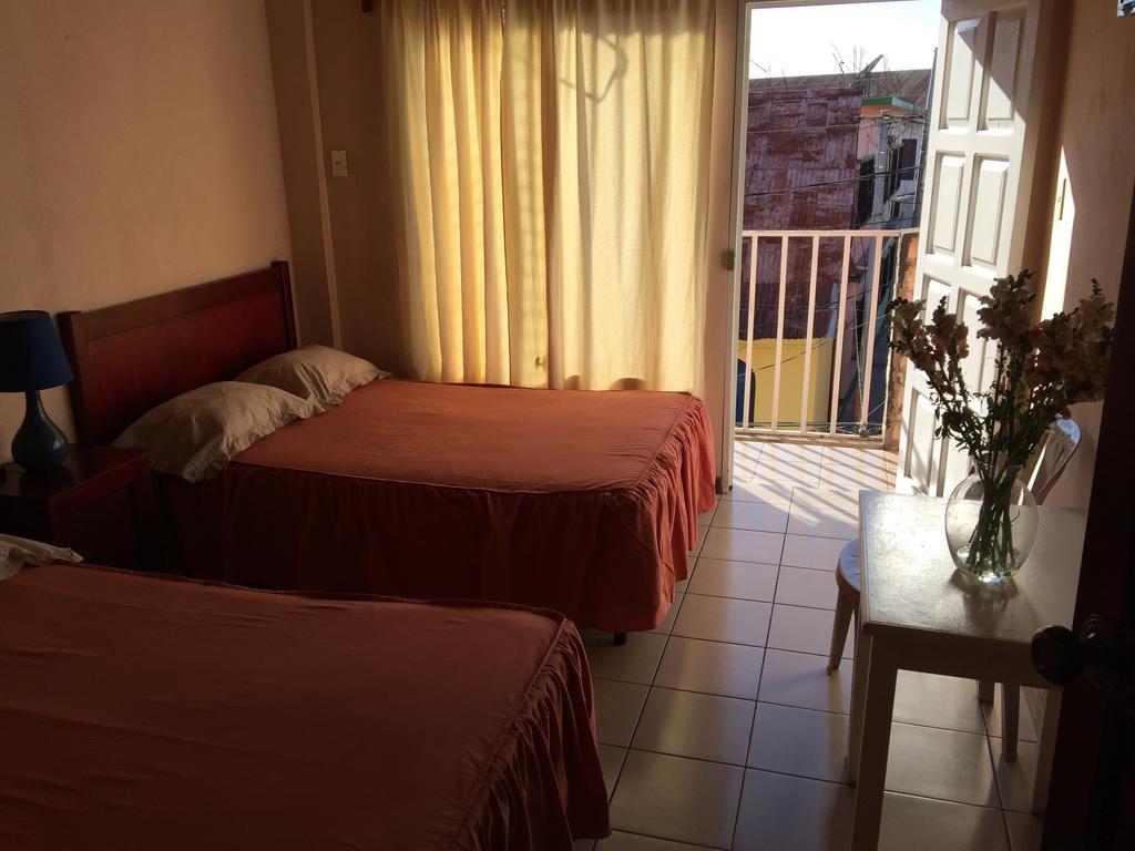 Hotel Villa Margarita Flores Quarto foto