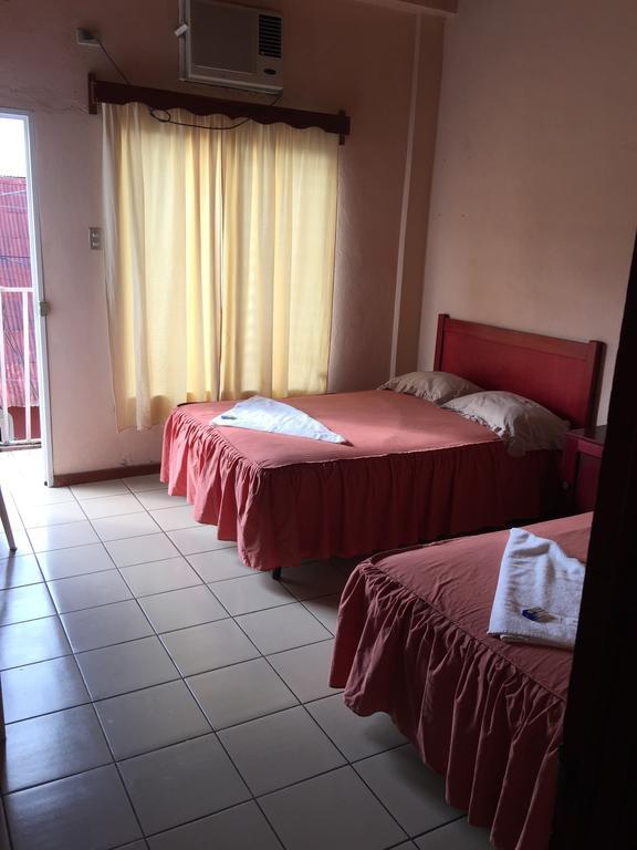 Hotel Villa Margarita Flores Quarto foto